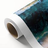 Vibrant rolled canvas art showcasing a serene beach landscape with gentle waves, golden sand, and a soft sunset glow, ideal for enhancing coastal decor.