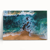 Stretched canvas wall art showcasing a serene beach landscape in soft pastel colors, leaning against a modern interior wall, perfect for coastal-themed decor.