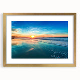 Framed wall art showcasing a serene beach landscape with golden matting, ideal for home décor, enhancing any room's ambiance with coastal charm.