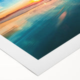 Vibrant rolled canvas depicting a serene beach landscape with vivid blues and sandy tones, ideal for coastal-themed decor. Perfectly packaged for delivery.