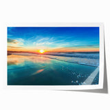 Rolled print showcasing a serene beach landscape with soft pastel colors and gentle waves, perfect for home decor and wall art enthusiasts.