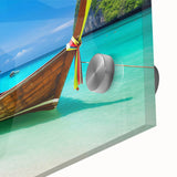 Close-up of a vibrant acrylic glass wall art piece showcasing a serene beach landscape, featuring soft waves, golden sand, and a pastel sunset, ideal for home decor.