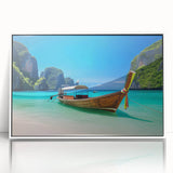 Framed wall art showcasing a serene beach landscape design with vibrant blues and soft whites, perfect for home decor, enhancing coastal-themed interiors.