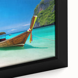 Framed canvas wall art showcasing a serene beach landscape with vibrant blue skies and golden sands, perfect for coastal home decor and relaxation.
