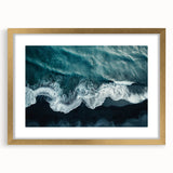 Framed wall art design showcasing a serene beach landscape in soft pastel colors, encased in an elegant gold frame with a mat, perfect for enhancing home decor.