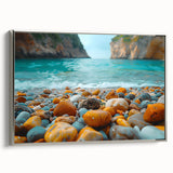 Framed canvas wall art featuring a serene beach landscape, encapsulated in a sleek silver frame, showcasing vibrant blues and sandy tones perfect for coastal decor.