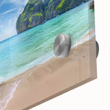 Close-up of a vibrant acrylic glass wall art piece showcasing a serene beach landscape with soft waves and golden sands, perfect for coastal decor enthusiasts.