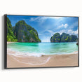 Framed canvas wall art of a serene beach landscape with vibrant sunset colors, showcasing a black frame from a side view, perfect for home decor.