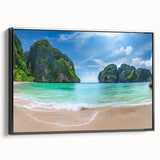 Framed canvas wall art of a serene beach landscape with vibrant sunset colors, showcasing a black frame from a side view, perfect for home decor.