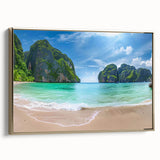 Framed canvas wall art showcasing a serene beach landscape with golden hues, perfect for coastal decor. The piece is elegantly designed for modern living spaces.