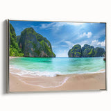 Framed canvas wall art showcasing a serene beach landscape with vibrant colors, silver frame, and side view highlighting its elegant design for modern decor.