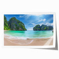 Vibrant rolled print of a serene beach landscape, showcasing soft waves and golden sands under a clear blue sky, ideal for home decor or relaxation spaces.
