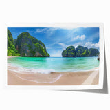 Vibrant rolled print of a serene beach landscape, showcasing soft waves and golden sands under a clear blue sky, ideal for home decor or relaxation spaces.