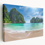 Stretched canvas wall art showcasing a serene beach landscape with vibrant blue skies and golden sand, perfect for coastal-themed decor in living spaces.