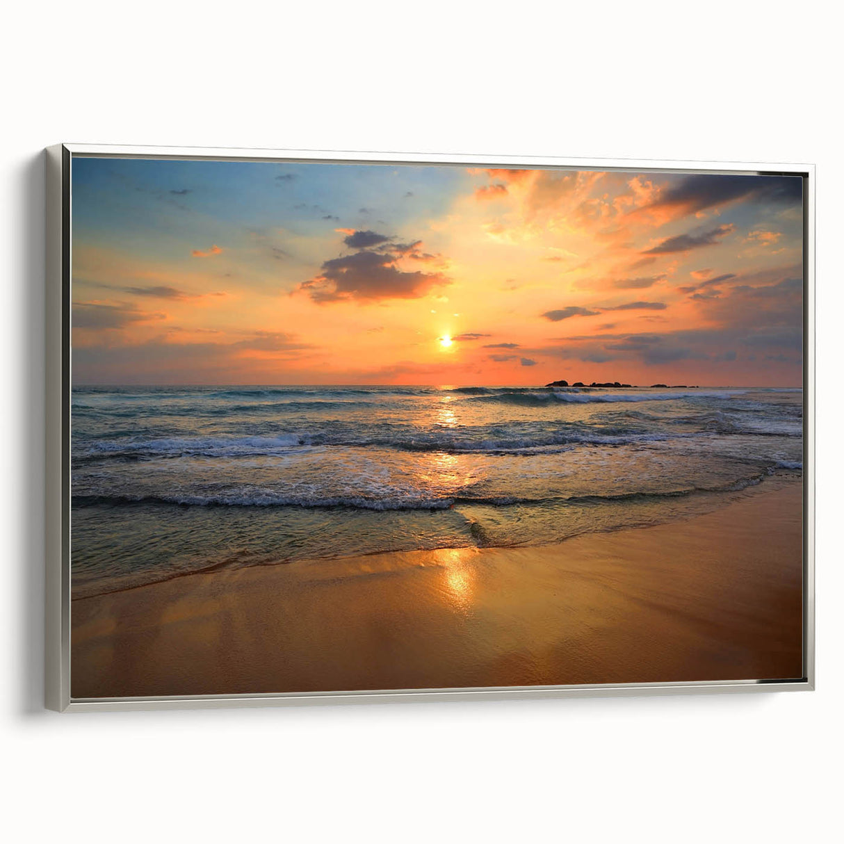 Framed canvas wall art showcasing a serene beach landscape, featuring vibrant colors and a silver frame, perfect for enhancing modern home decor.
