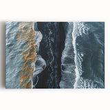 Stretched canvas wall art featuring a serene beach landscape with vibrant blues and sandy tones, ideal for coastal-themed interior decor. Perfect for enhancing living spaces with a calming ocean view.