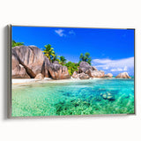 Framed canvas wall art showcasing a serene beach landscape with vibrant colors and silver accents, perfect for home decor in coastal-themed interiors.