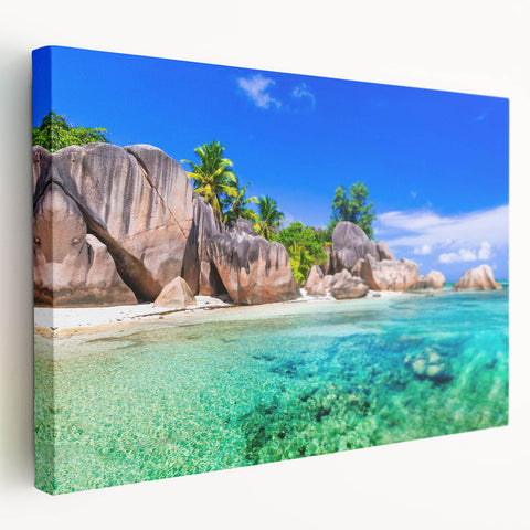 Stretched canvas wall art showcasing a vibrant beach landscape design, featuring vivid blues and sandy tones, perfect for coastal-themed decor.