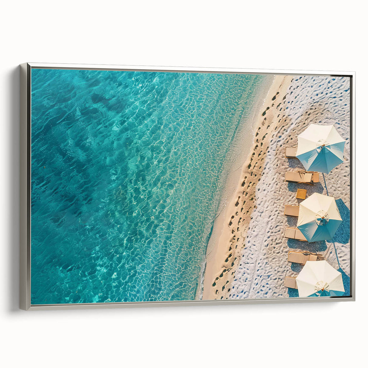 Framed canvas wall art showcasing a serene beach landscape in vibrant colors, accented with a sleek silver frame, ideal for home decor enhancement.