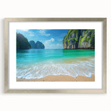 Framed landscape wall art collection showcasing serene beach scenes, featuring a silver mat and frame. Perfect for enhancing coastal-themed interiors.