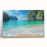 Stretched canvas wall art showcasing a serene beach landscape with vibrant colors, perfect for adding a coastal vibe to home decor. Ideal for living rooms or beach-themed spaces.