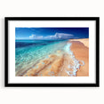 Framed black wall art featuring a serene beach landscape with vibrant colors, designed to enhance home decor. Ideal for adding a coastal touch to interiors.