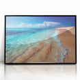 Framed acrylic wall art showcasing a serene beach landscape with vibrant colors, elegant black frame, ideal for enhancing home decor. Perfect for coastal-themed interiors.