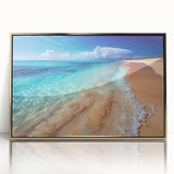Framed acrylic wall art featuring a vibrant beach landscape design with gold accents, showcasing serene ocean waves and a clear sky, ideal for home decor.