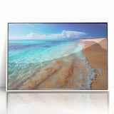 Framed acrylic wall art featuring a serene beach landscape with vibrant colors, presented in a sleek white frame, perfect for enhancing modern decor.