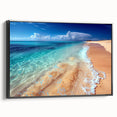 Framed canvas wall art showcasing a serene beach landscape with vibrant colors and intricate details, set in a sleek black frame, ideal for home decor.