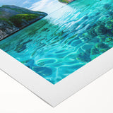 Rolled canvas wall art showcasing a vibrant beach landscape design with vivid blues and sandy tones, ideal for home decor and coastal aesthetics.