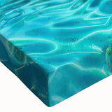 Close-up of a stretched canvas print showcasing a vibrant beach landscape design, featuring vivid colors and intricate details, perfect for home decor.
