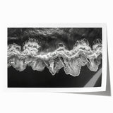 Vibrant rolled wall art print showcasing a serene beach landscape at sunset, featuring warm orange and pink hues, ideal for home decor and relaxation.