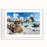 Framed white mat wall art showcasing a serene beach landscape design, perfect for home decor. The piece features soft pastel colors and vibrant ocean hues, adding tranquility to any room.