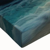 Close-up of a stretched canvas artwork showcasing a vibrant beach landscape design, featuring vivid blues and sandy tones, ideal for enhancing home decor.