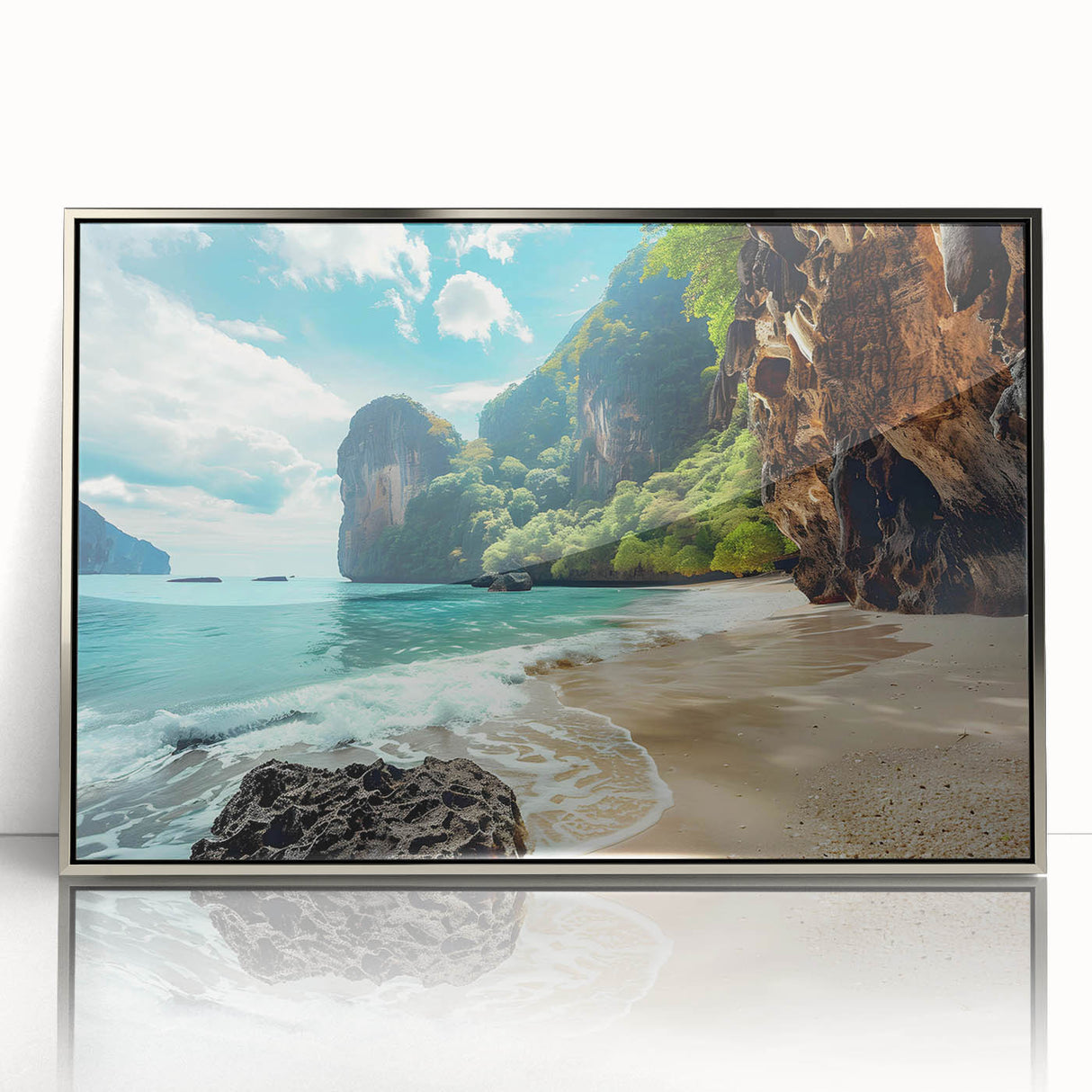 Framed wall art showcasing a serene beach landscape with vibrant sunset colors, elegantly displayed in a sleek silver frame, perfect for home decor enhancement.