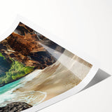 Vibrant rolled print of a serene beach landscape, showcasing soft sand and gentle waves under a clear blue sky, perfect for coastal-themed decor.