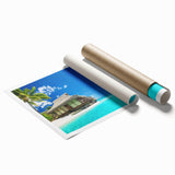 Vibrant rolled wall art print showcasing a serene beach landscape with soft blue skies and golden sands, perfect for home decor or coastal-themed interiors.