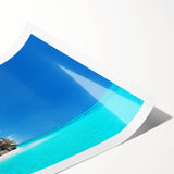 Vibrant rolled print of a beach landscape featuring golden sands and turquoise waves, perfect for home décor. The artwork captures a serene coastal scene, ideal for enhancing living spaces with a touch of nature.