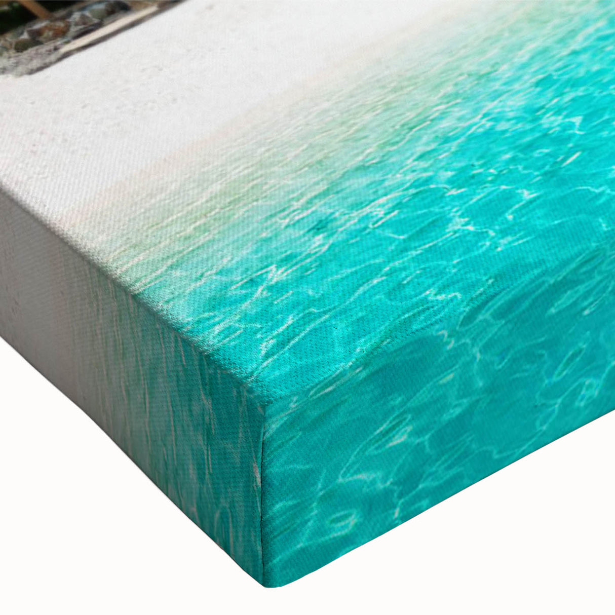Close-up of a stretched canvas wall art featuring a vibrant beach landscape design with soft blues and sandy tones, perfect for coastal decor enthusiasts. This artwork adds a serene and calming atmosphere to any room, enhancing its aesthetic appeal.