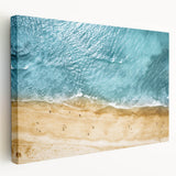 Stretched canvas wall art showcasing a vibrant beach landscape design, featuring soft waves and a sunset palette, perfect for coastal-themed decor.
