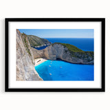 Framed wall art featuring a serene beach landscape, showcasing vibrant colors and a black matting that enhances the visual depth, perfect for home decor.