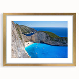Elegant wall art collection featuring a framed beach landscape design with a gold mat, showcasing vibrant ocean hues and serene coastal scenery, ideal for home decor.