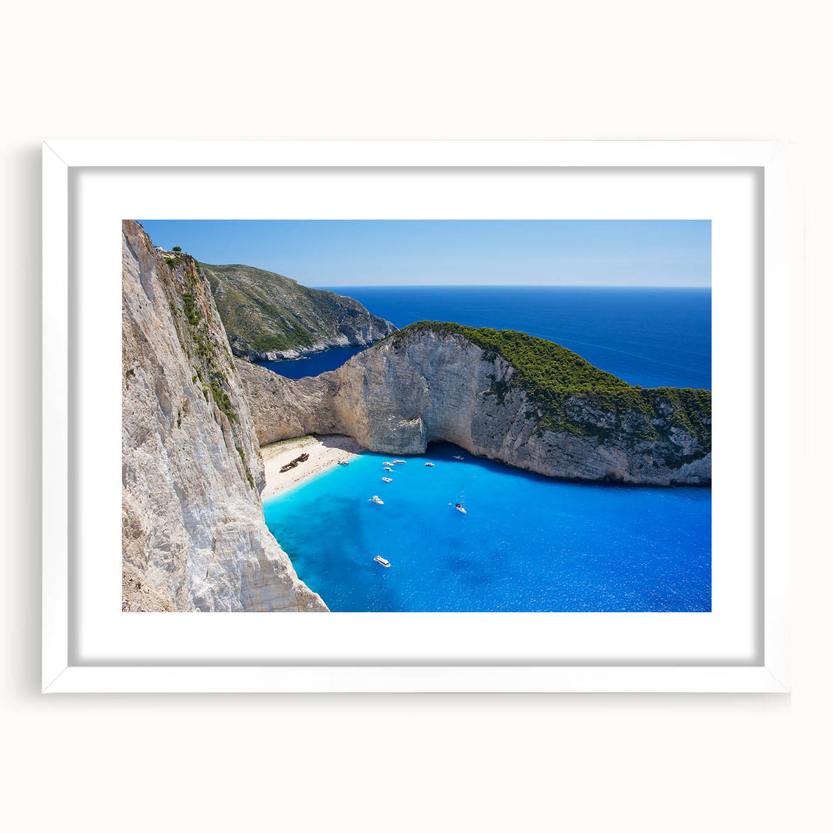 Framed landscape wall art depicting serene beach scenery, featuring a white mat and sleek frame, ideal for home decor or office aesthetics, invoking tranquility.
