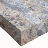 Close-up of a vibrant stretched canvas wall art piece showcasing a serene beach landscape with soft waves and a colorful sunset, perfect for home decor.