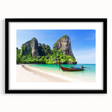 Framed black wall art featuring a scenic beach landscape design, complete with a white mat, showcasing tranquil ocean waves and serene skies, perfect for home decor.