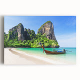 Stretched canvas wall art displaying a serene beach landscape with vibrant blue waters and golden sand, perfect for coastal home decor accents.