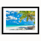 Framed wall art featuring a serene beach landscape with vibrant colors, set in a sleek black frame with a mat, ideal for coastal-themed decor.