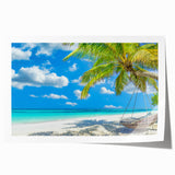 Rolled wall art print showcasing a vibrant beach landscape design, featuring vivid blues and sandy tones, perfect for home decor, packaged securely in a cardboard tube.