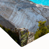 Stretched canvas artwork showcasing a vibrant beach landscape design with vivid colors and intricate details, perfect for enhancing home decor.